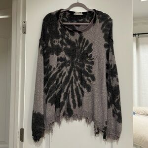 Peach Love black/ gray sweater. Size medium.